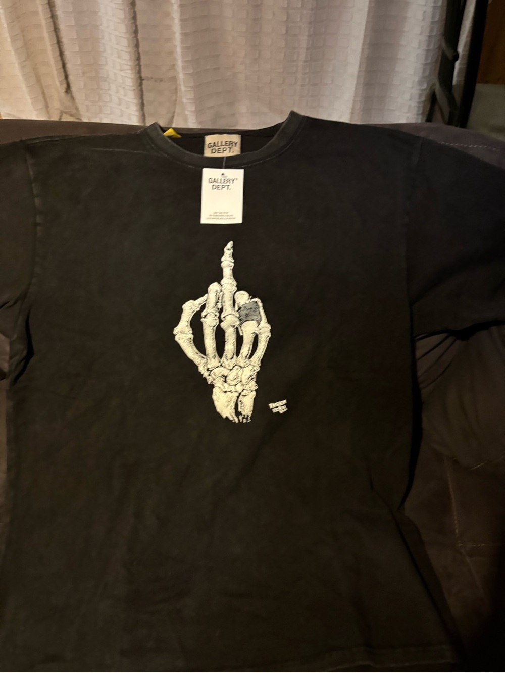 Gallery Dept Black Tee with White Skeleton Middle Finger Graphic